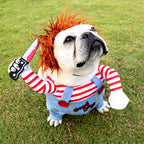Bulldog looking up in striped shirt and overalls Halloween costume with red wig and foam knife